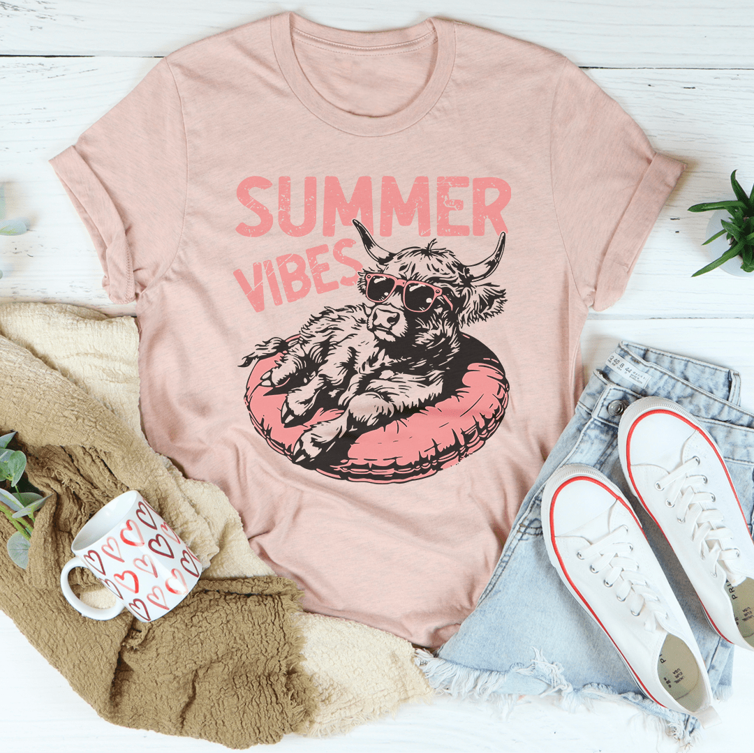 Heather prism peach Summer Vibes T-shirt by MerchMallow featuring a vibrant summer-themed design on soft cotton fabric.