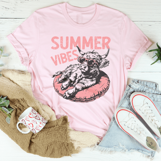 Pink Summer Vibes T-shirt by MerchMallow featuring a relaxed fit and vibrant summer-themed graphic design.